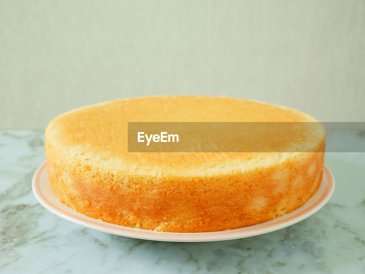 Homemade yogurt cake on a white plate