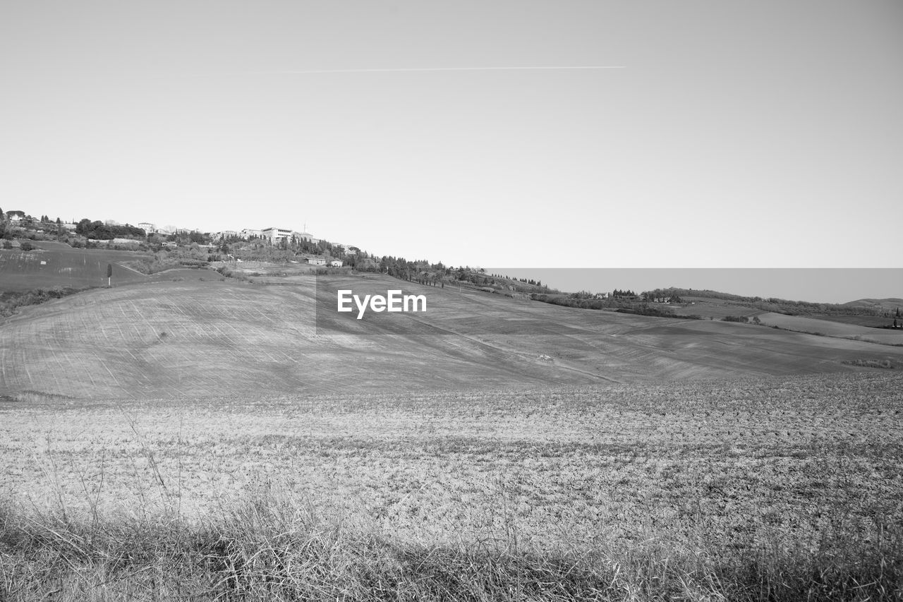 SCENIC VIEW OF FARM AGAINST CLEAR SKY