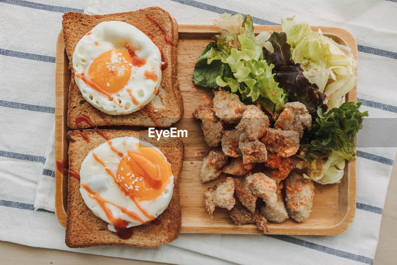 HIGH ANGLE VIEW OF BREAKFAST SERVED ON PLATE