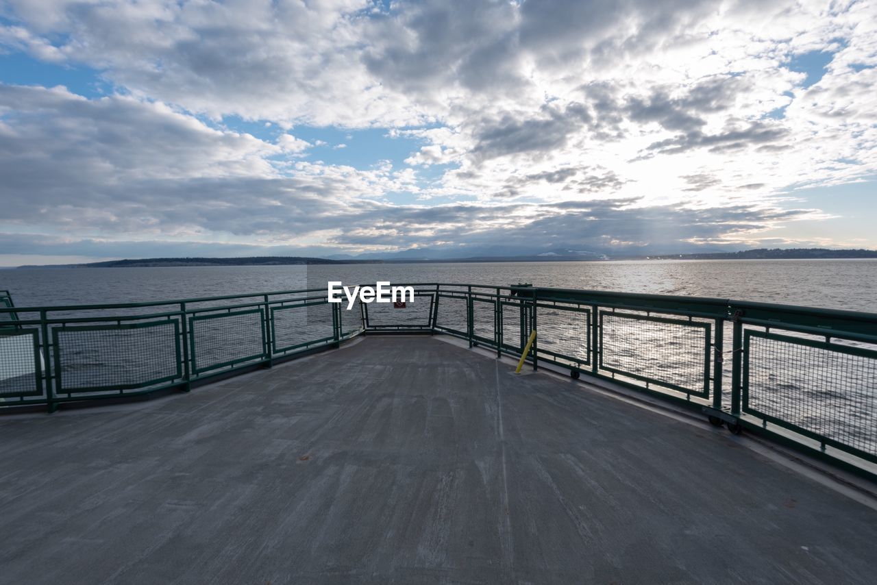 Landscape of water and clouds from a ferry in the puget sound