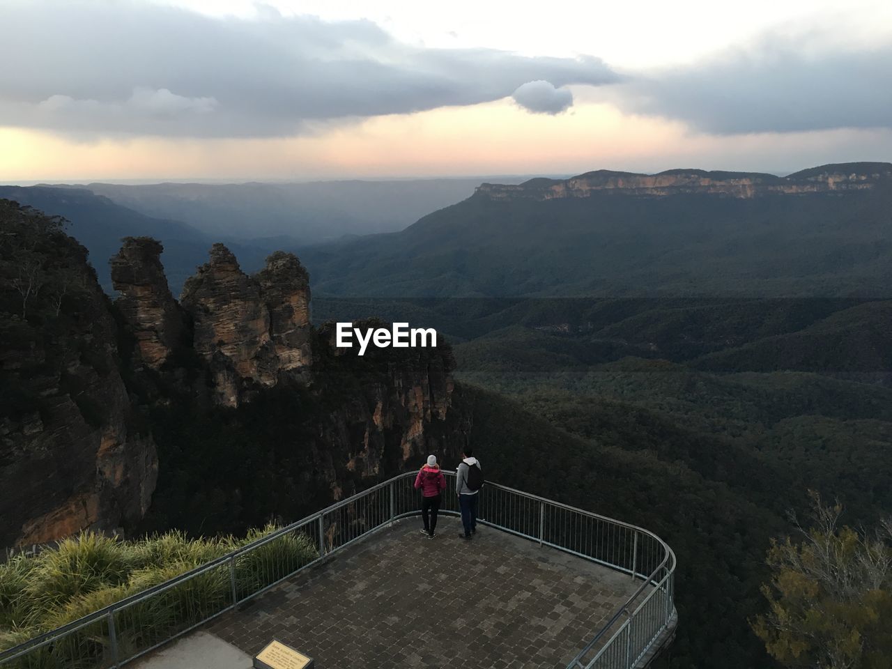 High angle view of friends standing at observation point