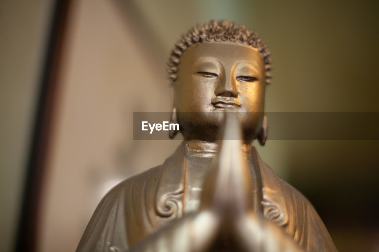 Low angle view of a statue of buddha