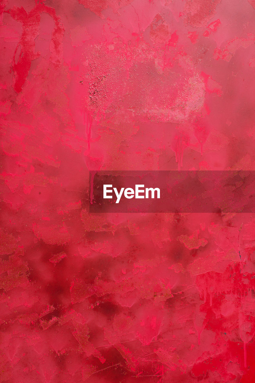 CLOSE-UP VIEW OF RED ABSTRACT BACKGROUND