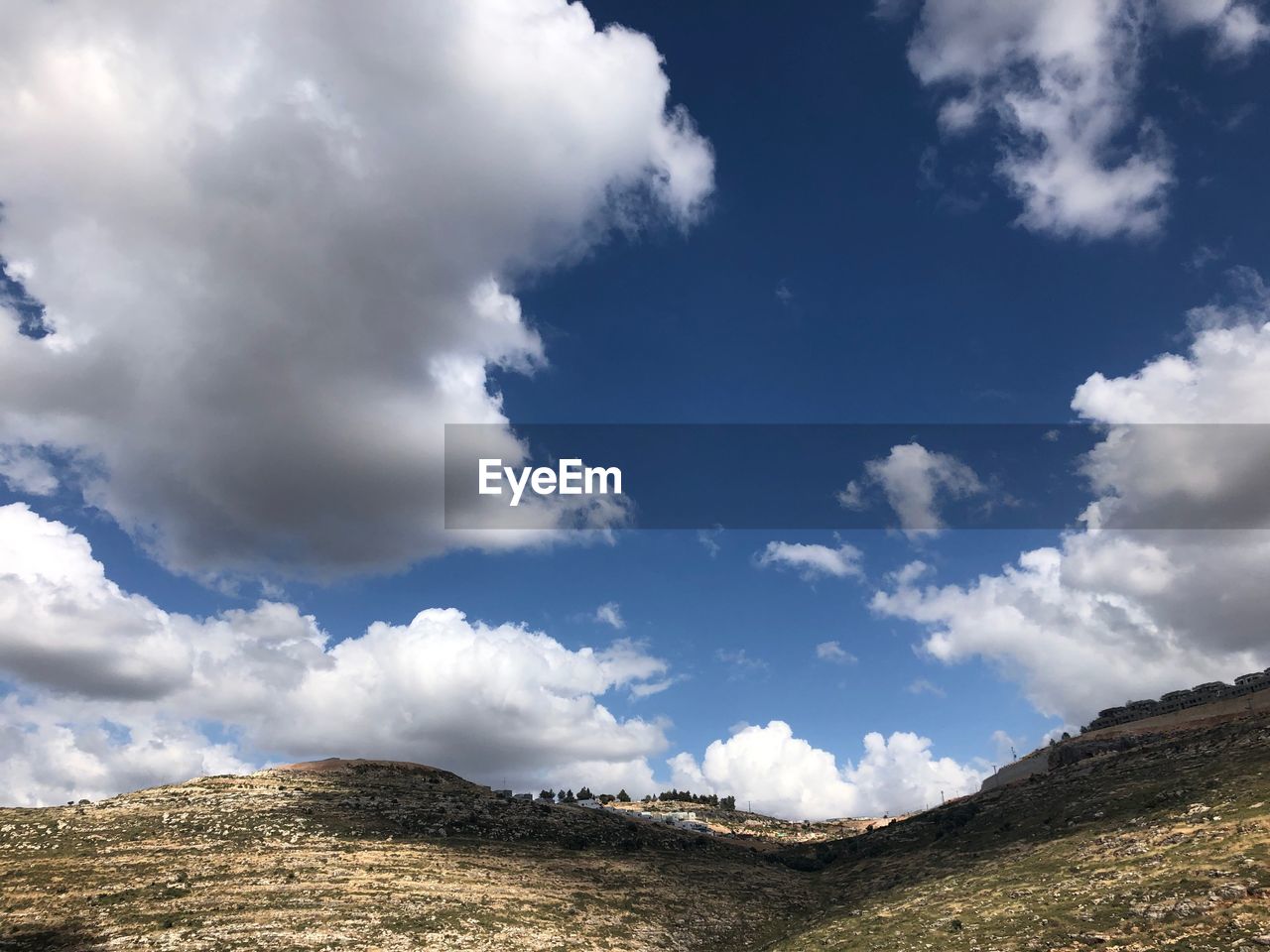 LOW ANGLE VIEW OF ARID LANDSCAPE