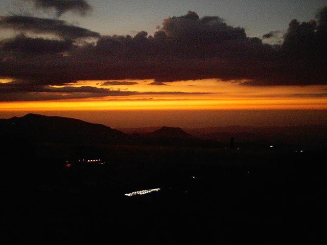 SILHOUETTE OF LANDSCAPE AT SUNSET