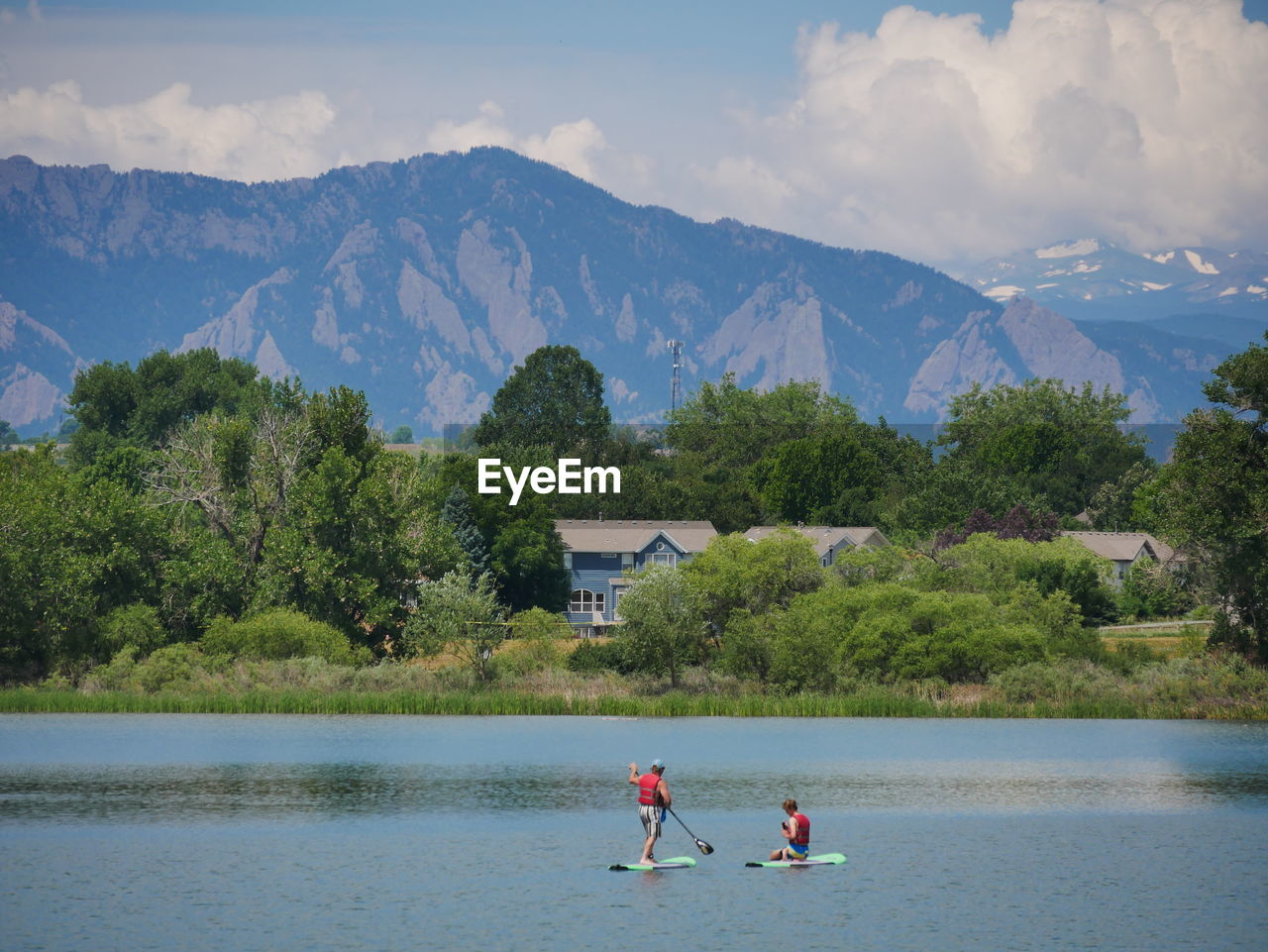 People paddleboarding in waneka lake park