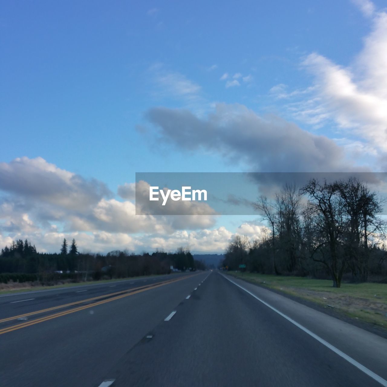 ROAD PASSING THROUGH LANDSCAPE