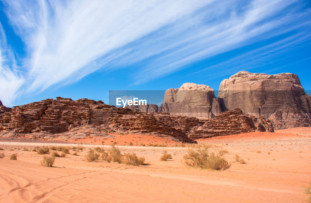 Rock formations in desert against sky