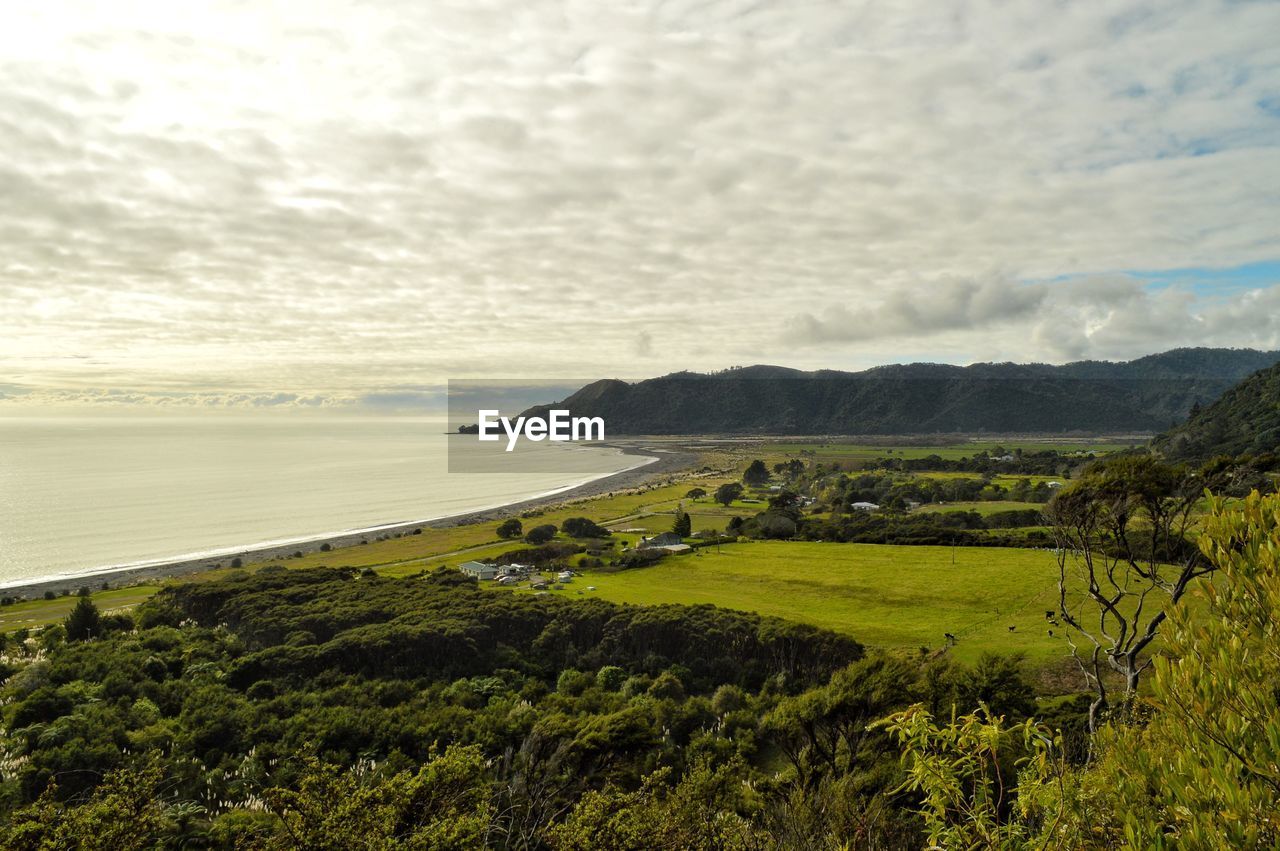 Scenic view of beach against sky