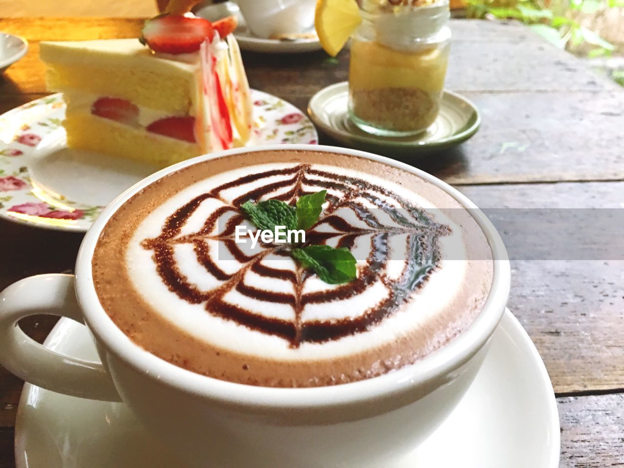 Close-up of cappuccino on table