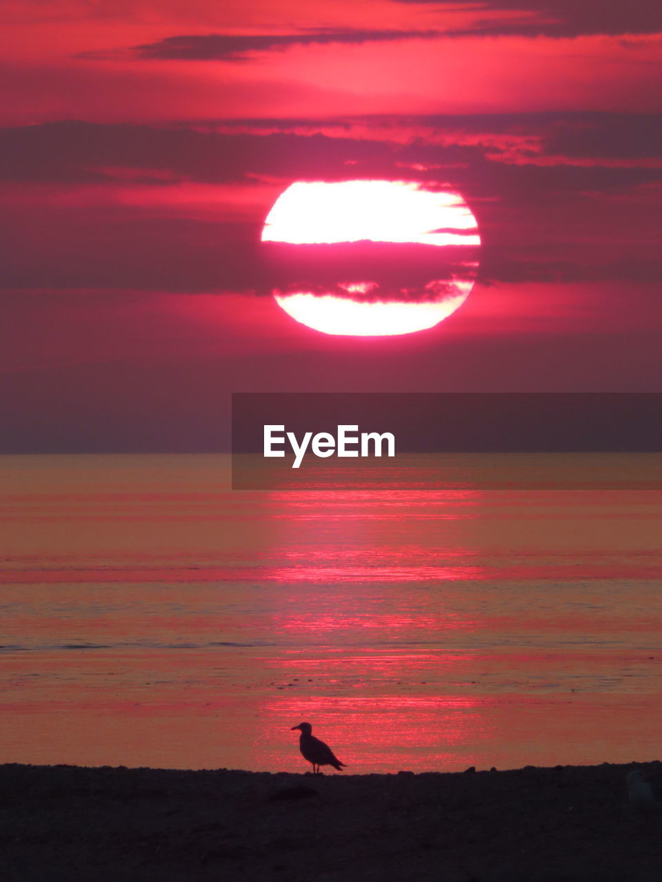 SCENIC VIEW OF SUNSET SKY OVER SILHOUETTE OF LANDSCAPE