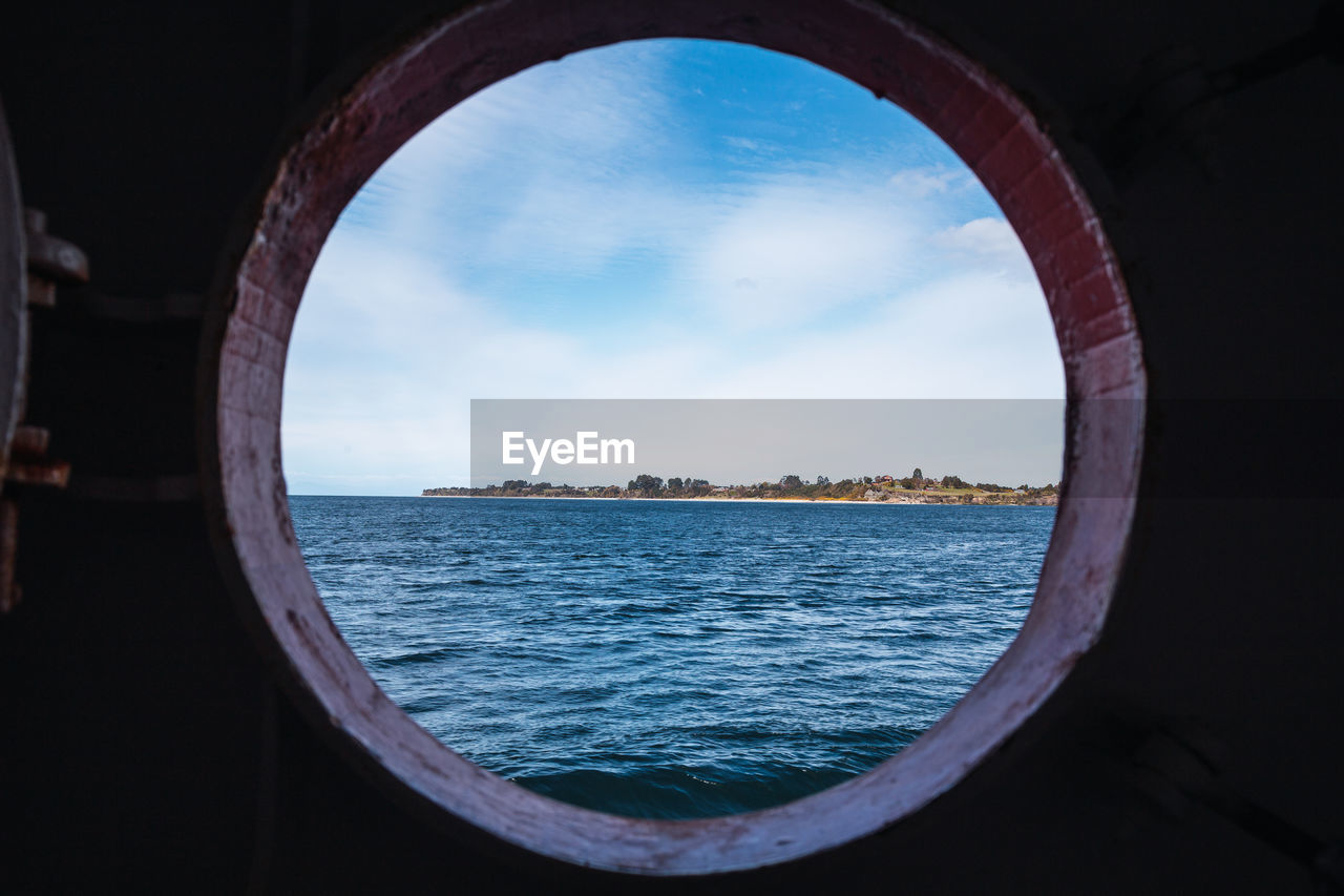 A view of and islan of south america from a boat window