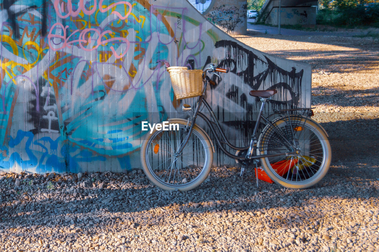 Bicycles parked on road in city