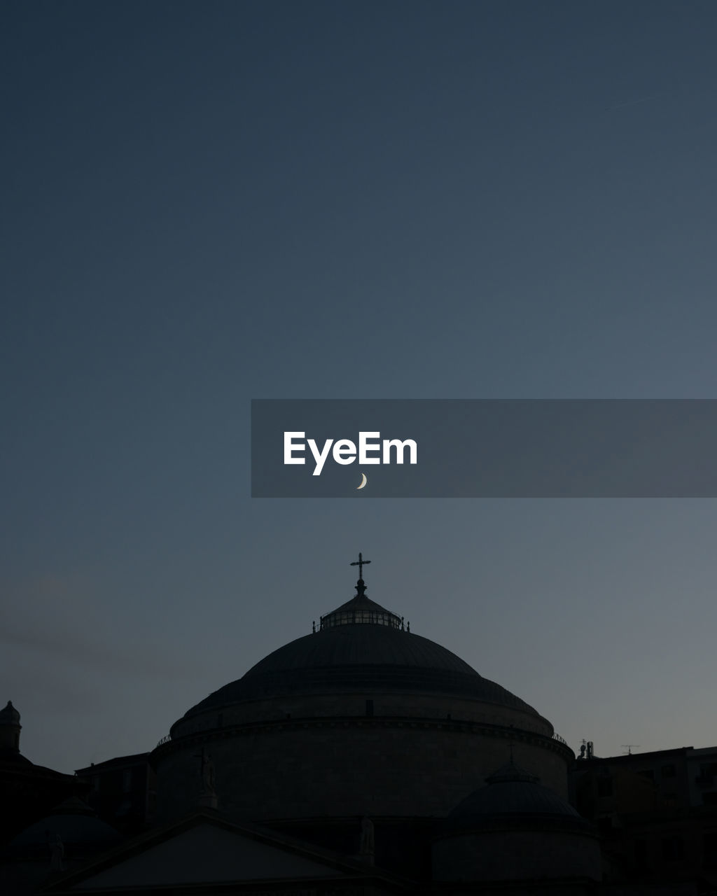 The moon above the church