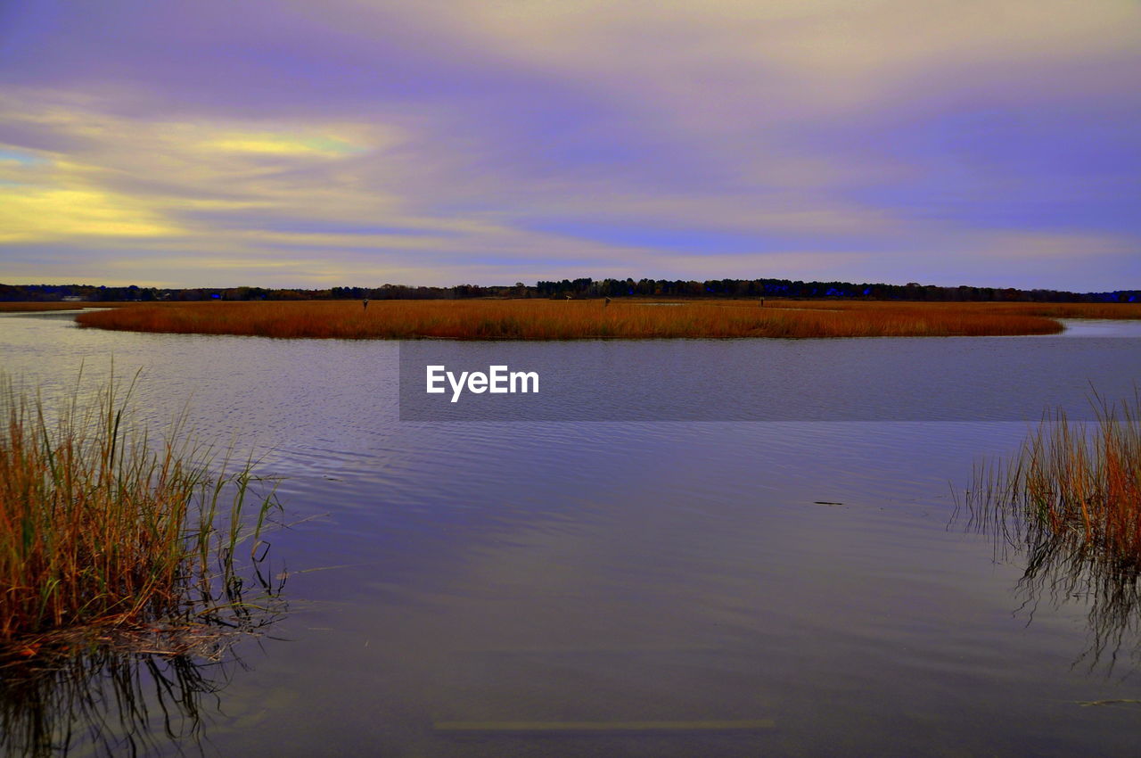 SCENIC VIEW OF CALM LAKE