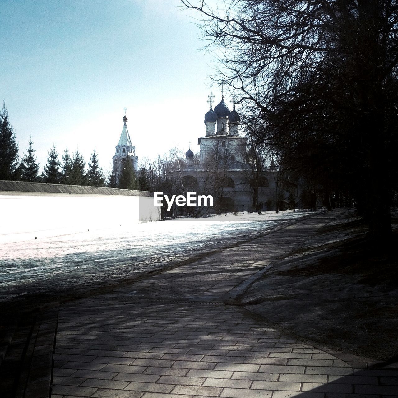 Church against clear sky with pathway in foreground