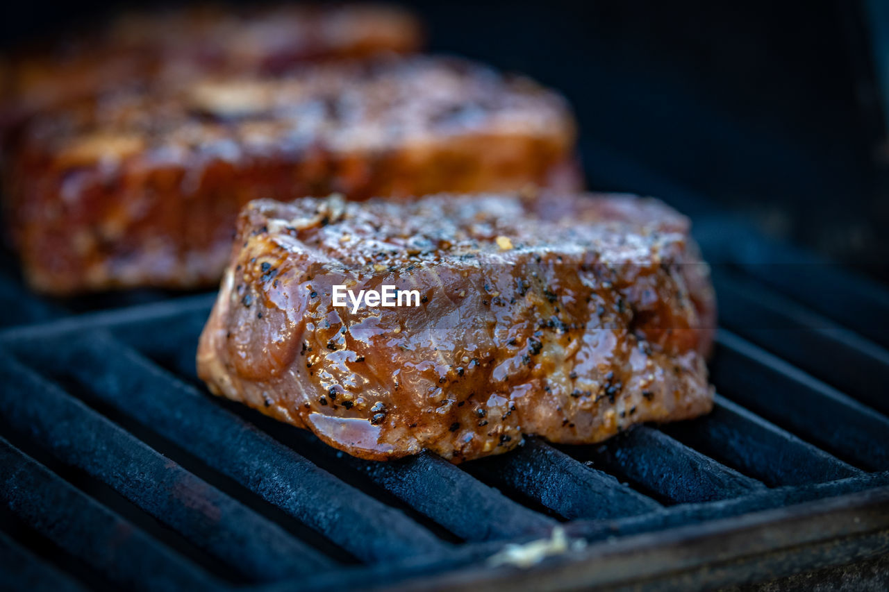 Close-up of meat on barbecue grill