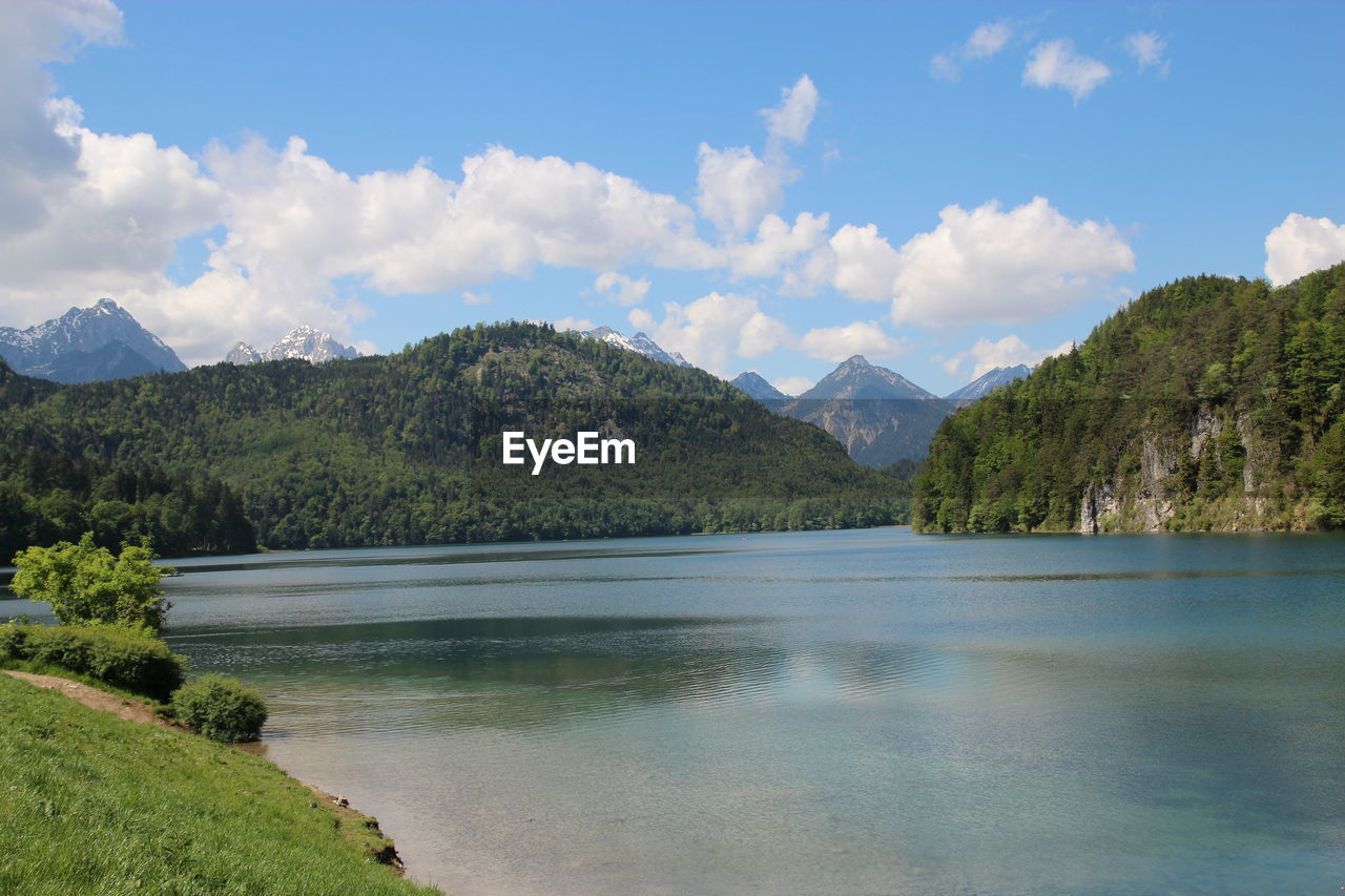 SCENIC VIEW OF LAKE AND MOUNTAINS