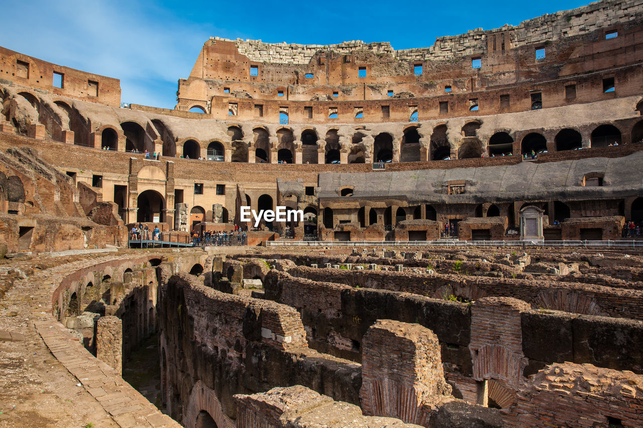 View of the seating areas and the hypogeum of the ancient colosseum in rome