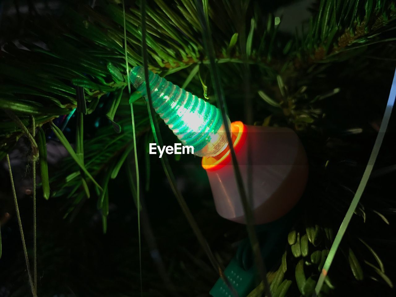 CLOSE-UP OF ILLUMINATED LANTERNS