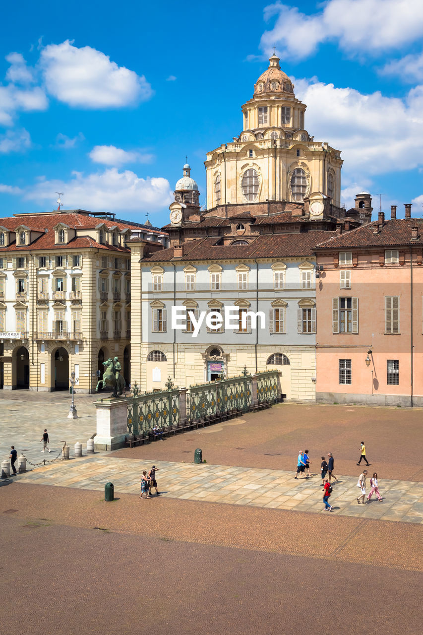 Group of people in front of historical building