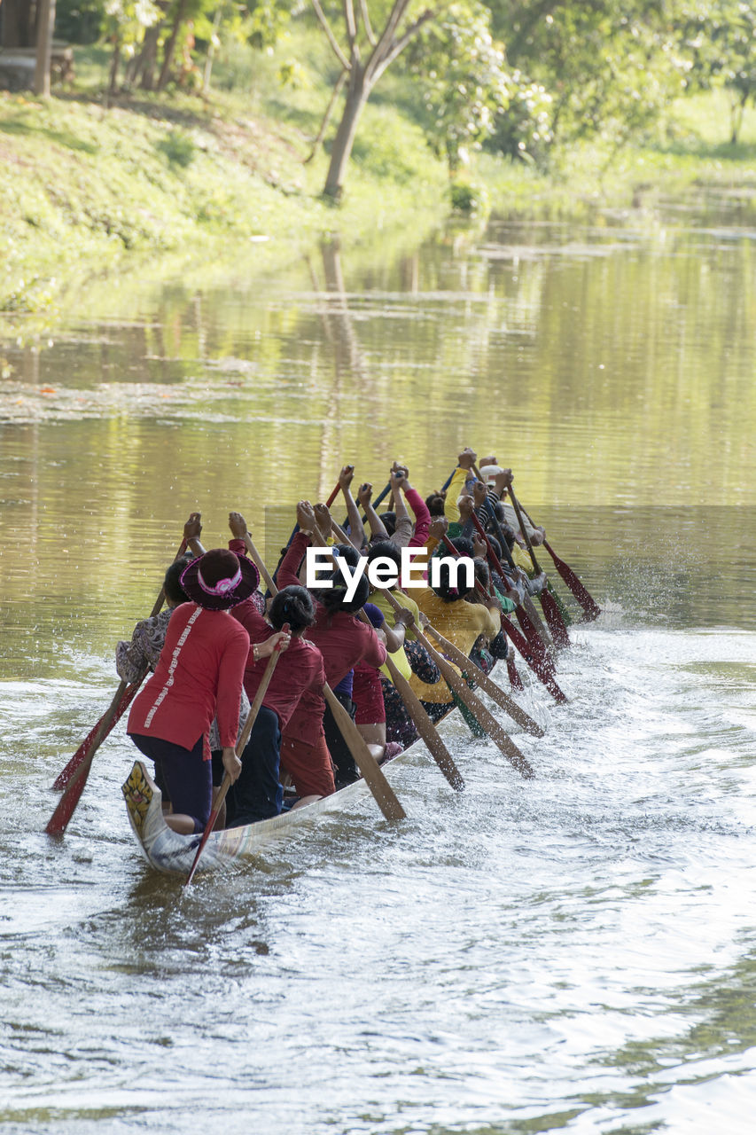 GROUP OF PEOPLE IN BOAT