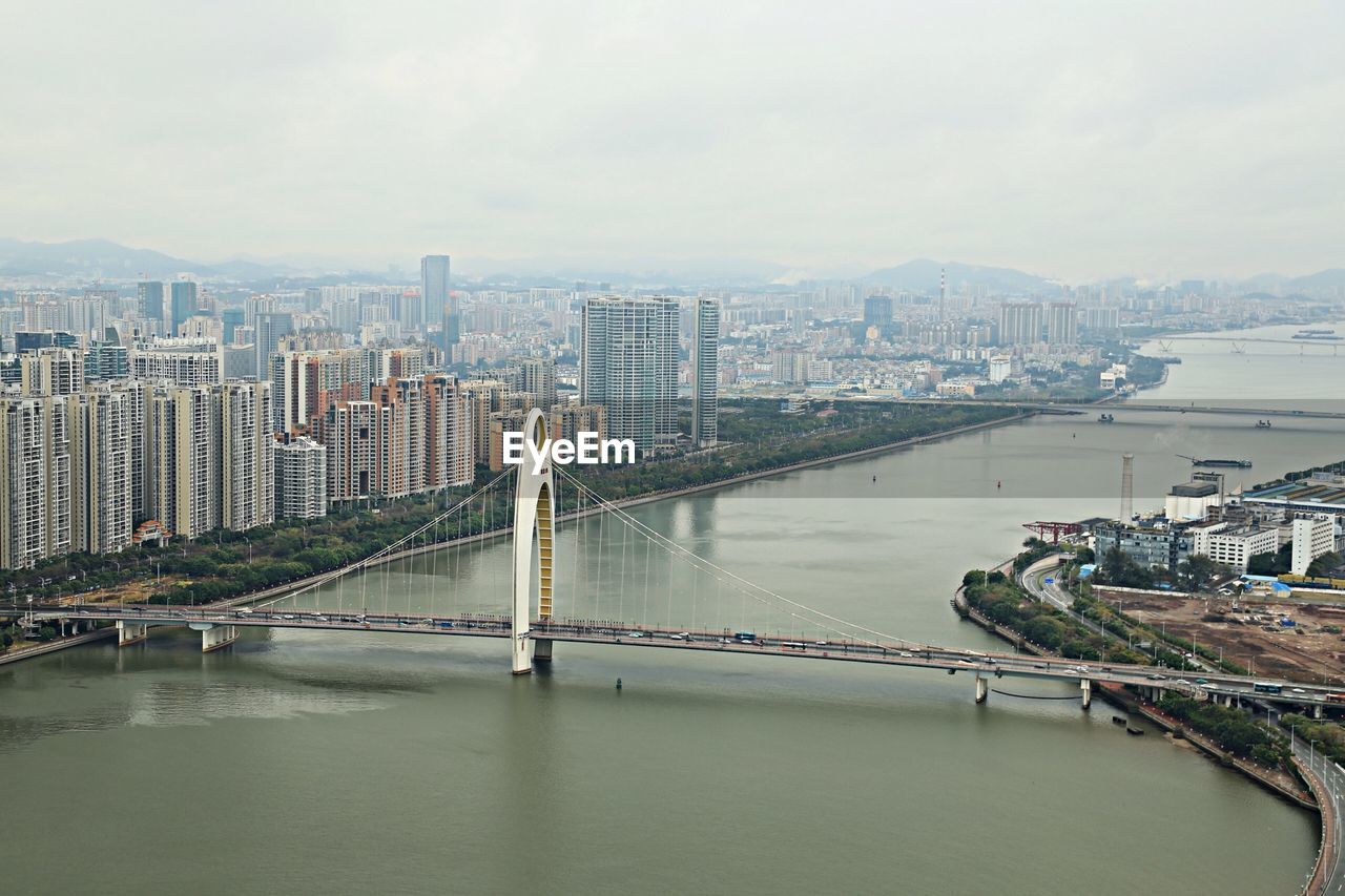 High angle shot of river along cityscape