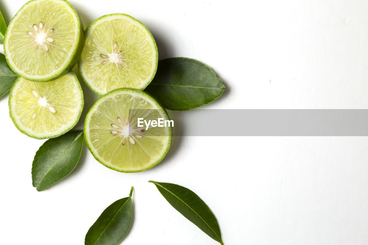 HIGH ANGLE VIEW OF FRUITS AND LEAVES