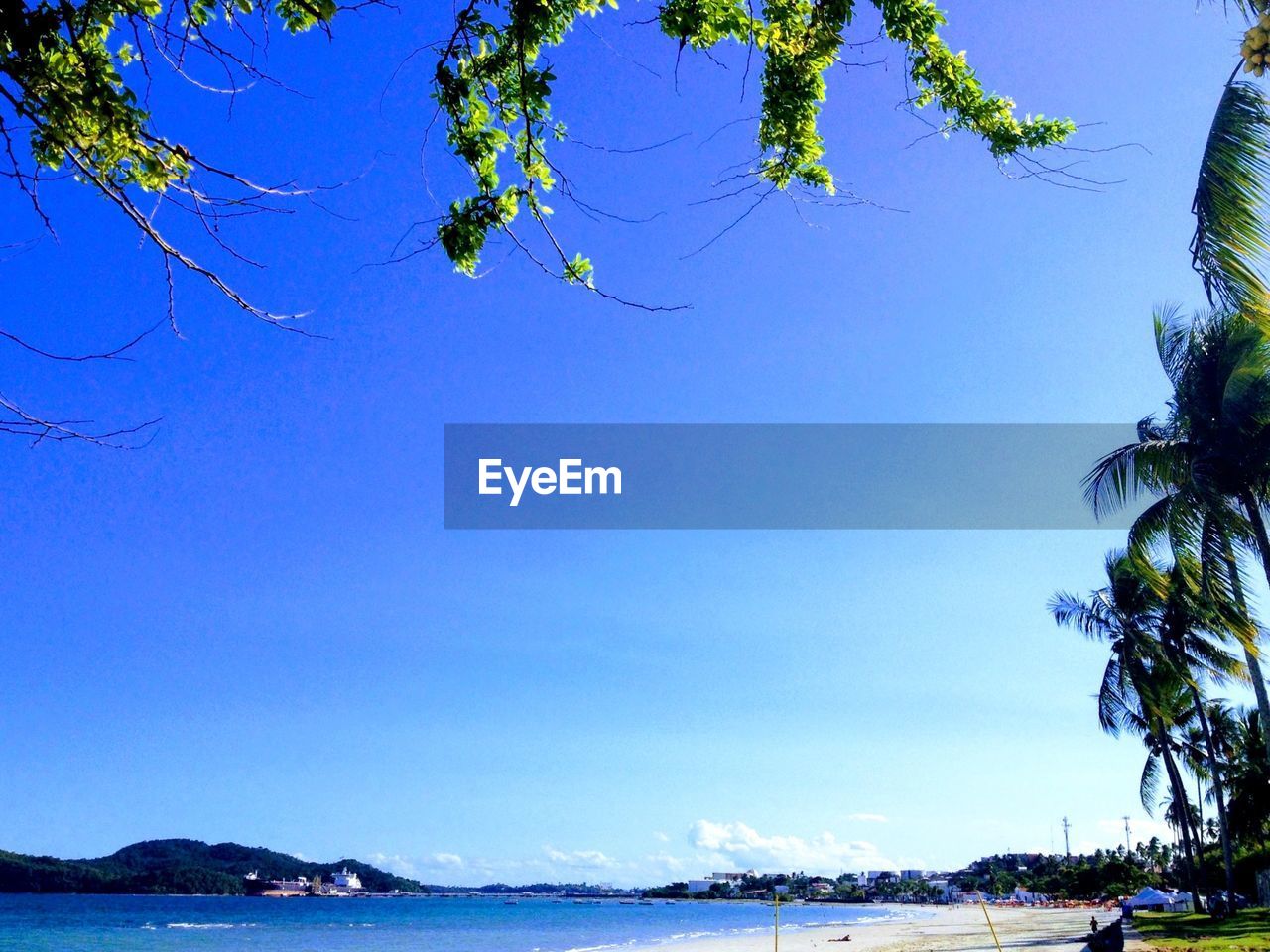 VIEW OF SEA AGAINST BLUE SKY