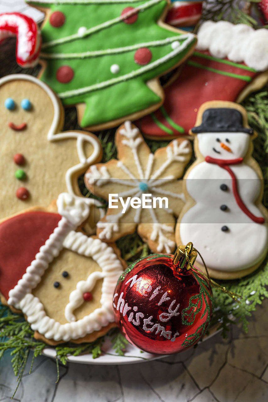 Directly above shot of gingerbread cookies and decorations