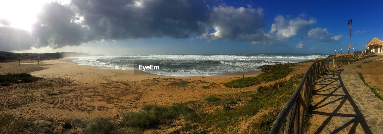 Panoramic view of beach against sky
