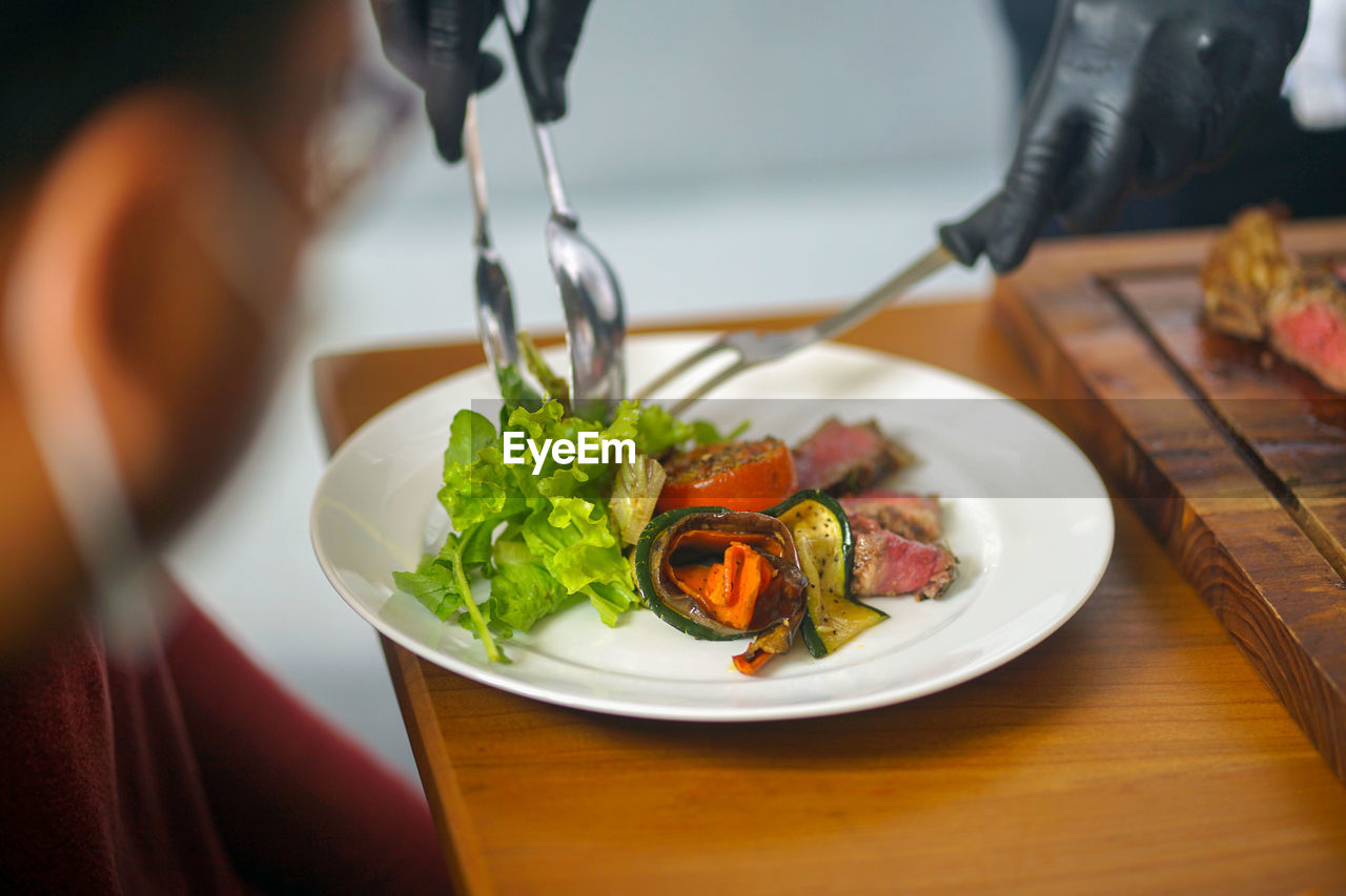 Close-up of food in plate on table