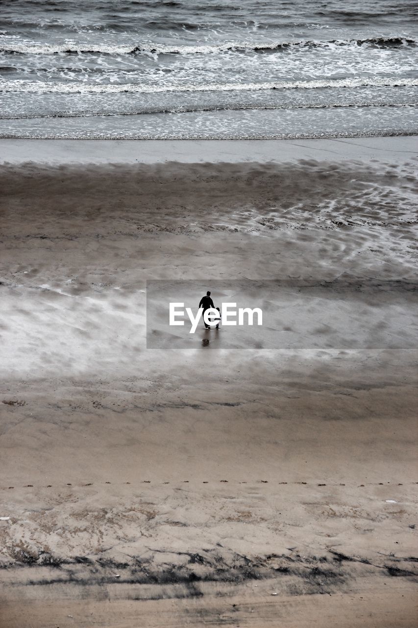 VIEW OF PEOPLE ON BEACH