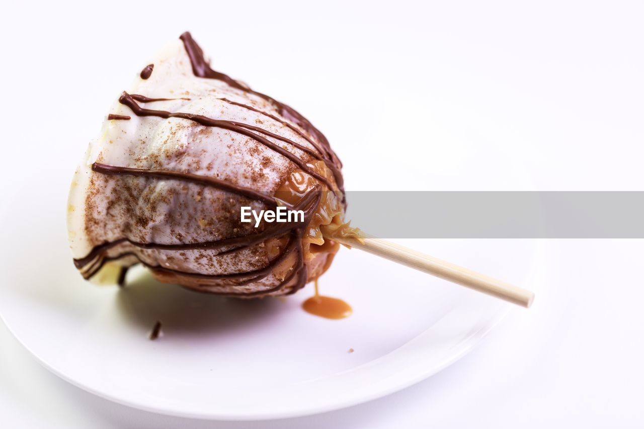 Apple caramel candy on the plate