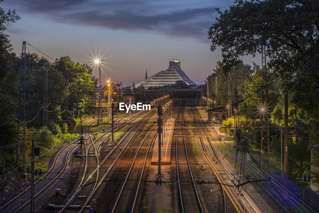 High angle view of railroad junction at dusk