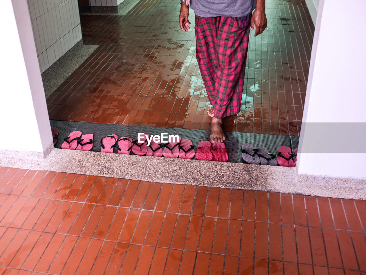 low section of woman standing on floor