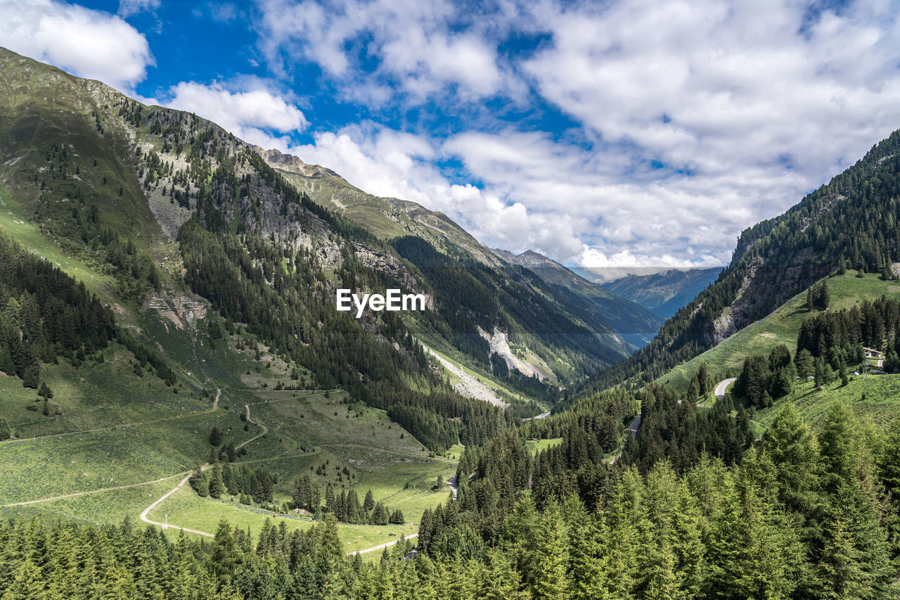 SCENIC VIEW OF MOUNTAIN AGAINST SKY