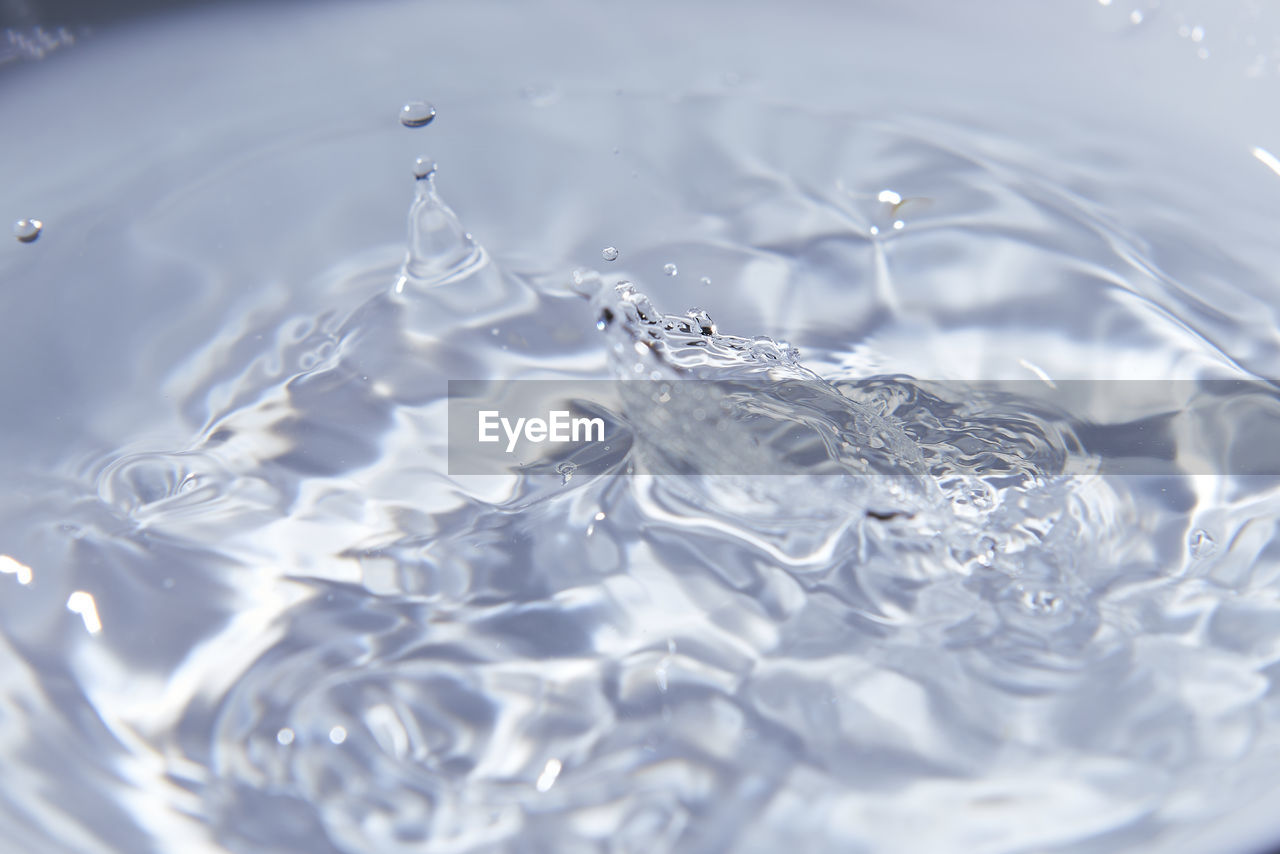 water, rippled, petal, splashing, drop, motion, nature, no people, freezing, close-up, freshness, backgrounds, food and drink, blue, selective focus, macro photography, refreshment, purity, indoors, full frame, falling, reflection, ice
