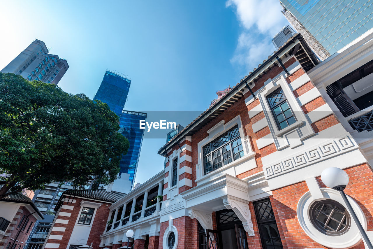 LOW ANGLE VIEW OF BUILDING AGAINST SKY