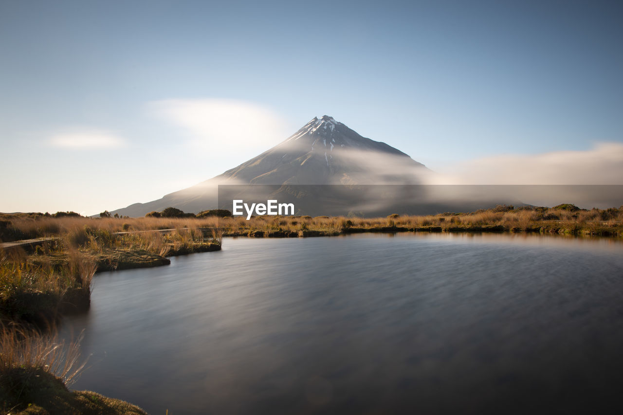 SCENIC VIEW OF SNOWCAPPED MOUNTAIN AGAINST SKY