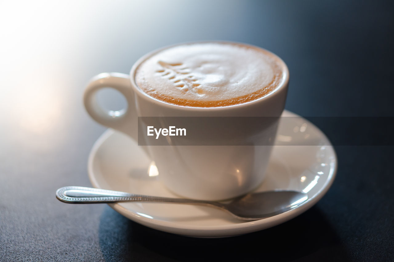 CLOSE-UP OF COFFEE ON TABLE