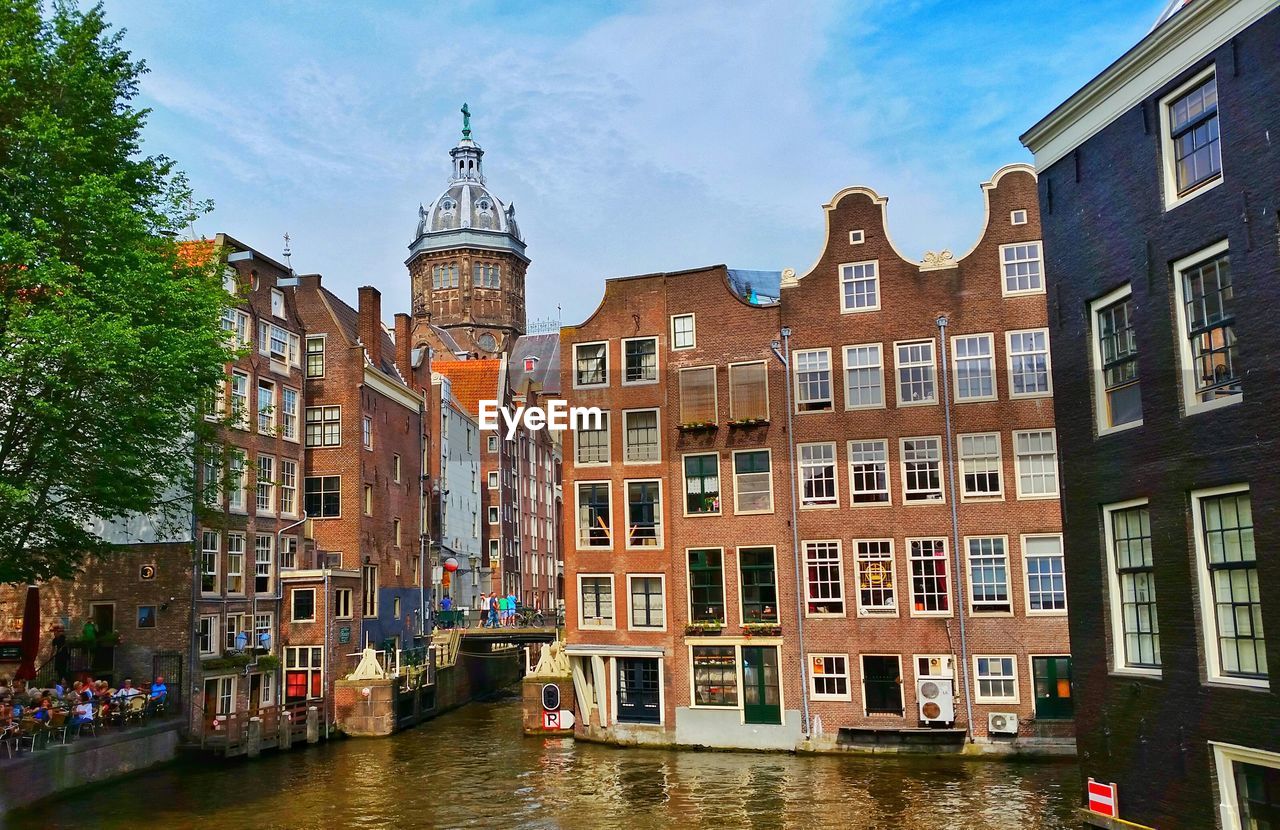 River with buildings against the sky