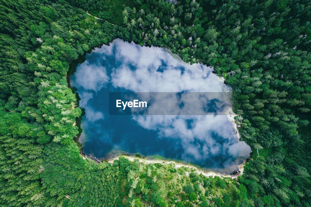 Aerial view of cloud reflections on water, lake eibensee near salzburg, austria.