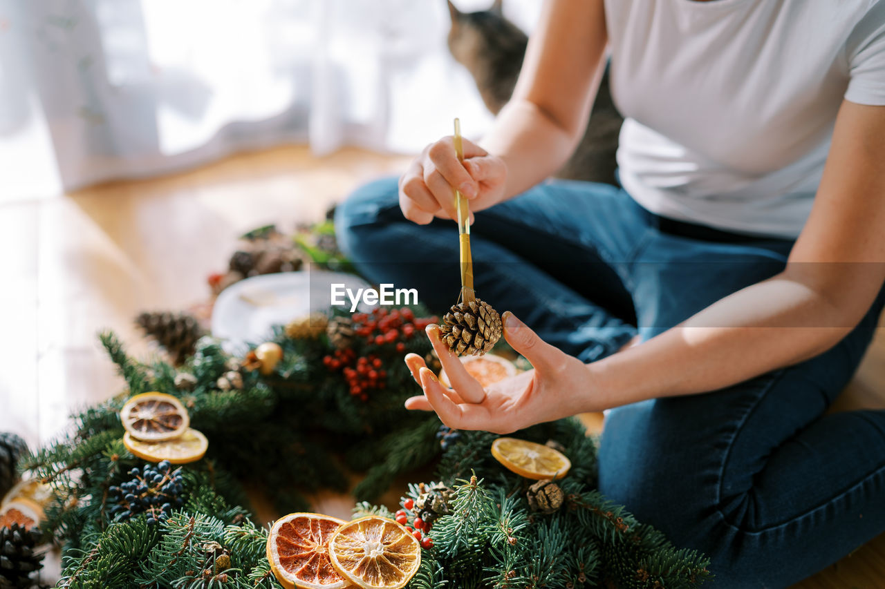 midsection of woman holding food