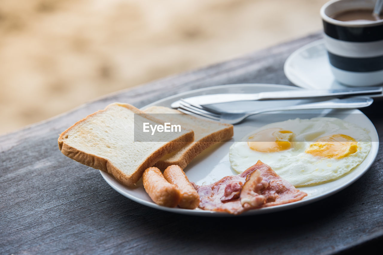 Close-up of breakfast served on table