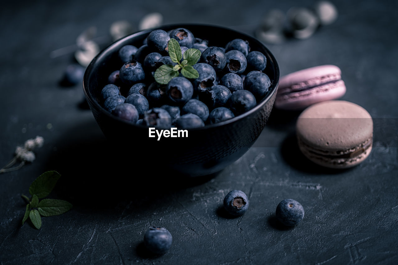 Close-up of blueberries in bowl on table