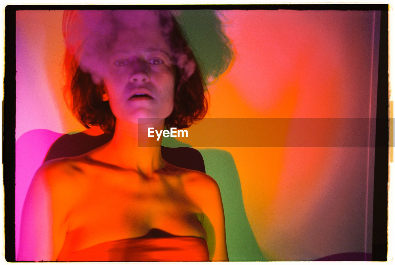 one person, portrait, women, adult, headshot, young adult, studio shot, front view, indoors, human face, looking, waist up, orange color, orange, multi colored, female, hairstyle, auto post production filter, person