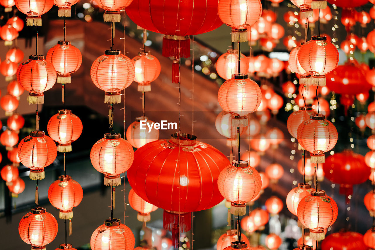 Illuminated lanterns hanging at night