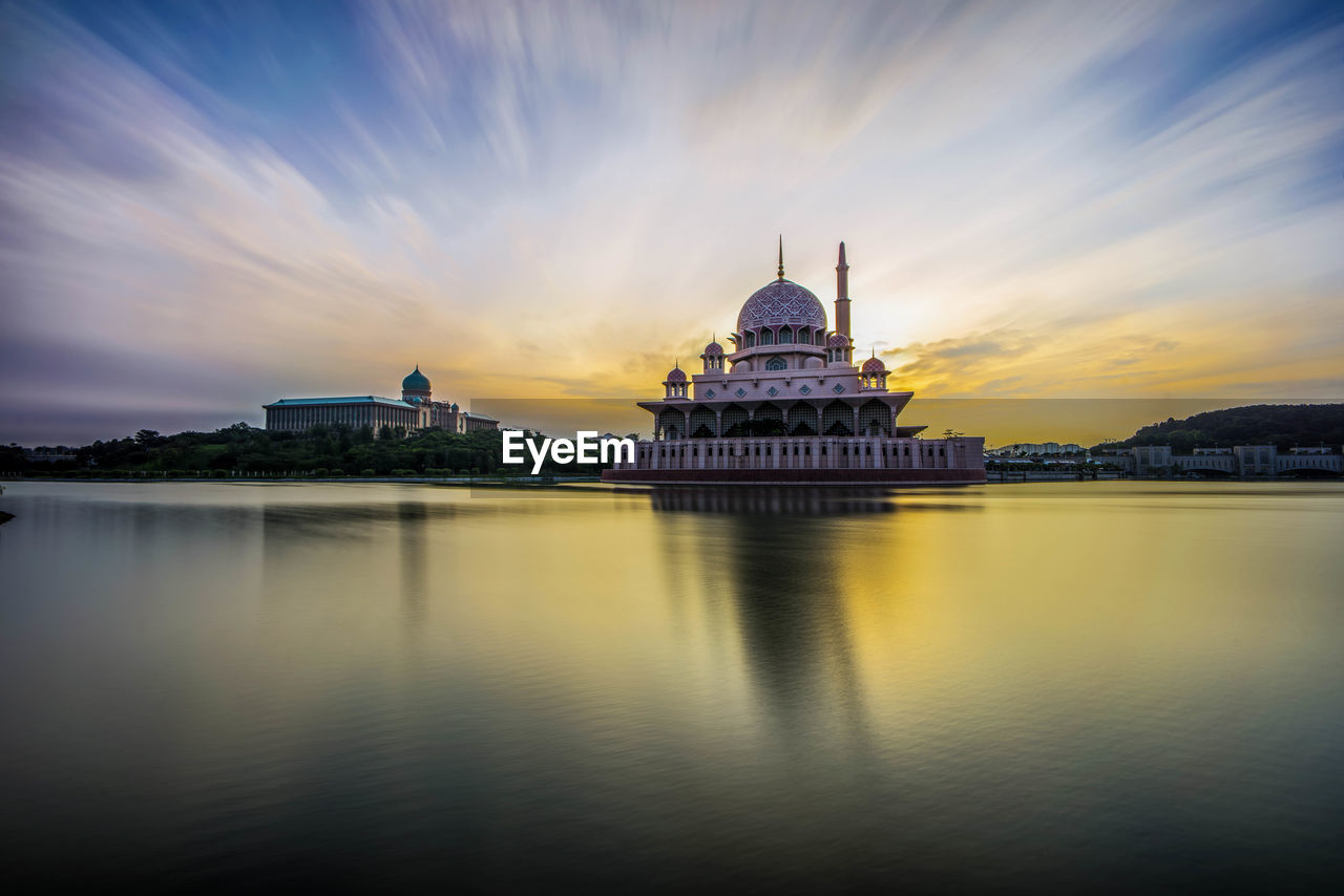 View of illuminated city at dusk