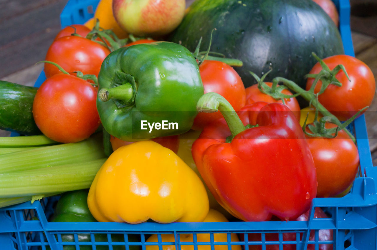 Close-up of colorful food in crate on table